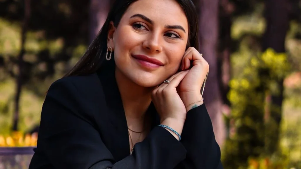 Smiling confident woman portrait for male stamina supplement article